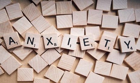 The word "anxiety" spelled out in scrabble